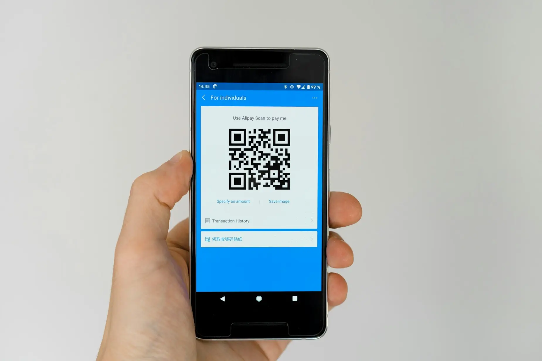 black android smartphone displaying qr code